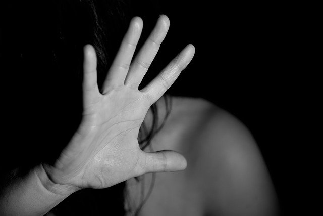 Picture of woman holding up hand