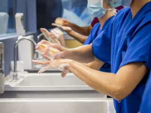 Close up of hands being washed before surgery
