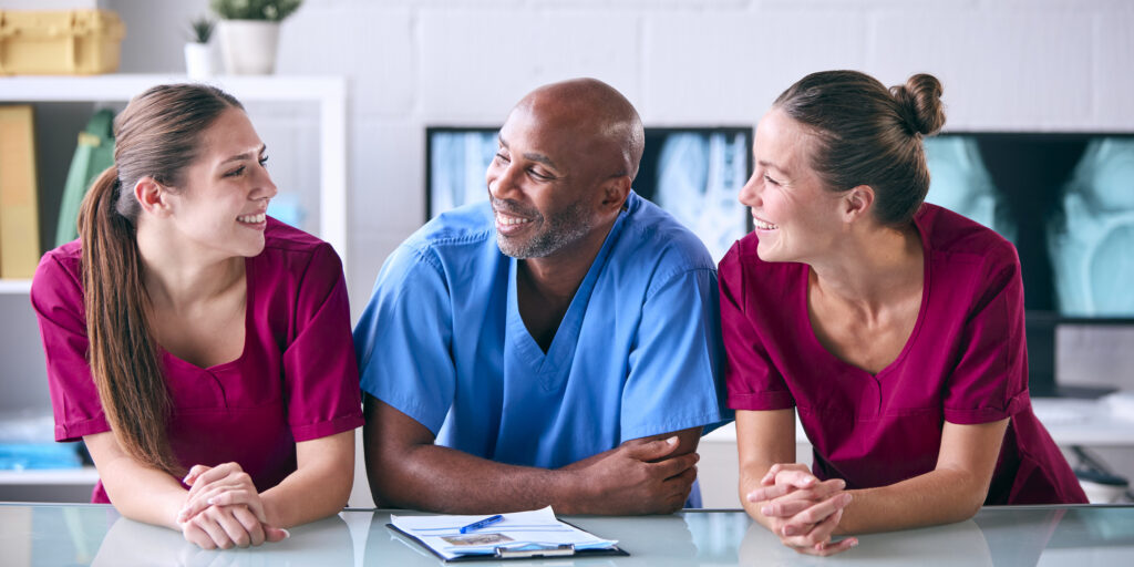Portrait Of Male And Female Veterinary Team